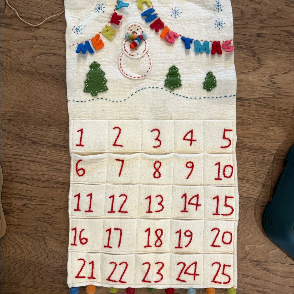 Festive Christmas Countdown Calendar with Red Accents